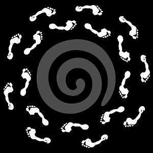 Human black footprints go in circles way white background isolated, barefoot person foot prints walk around in circles pattern