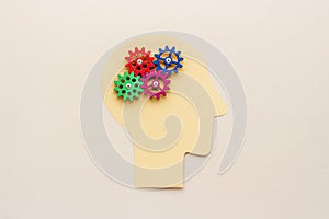 Human brain as puzzle of gears and cogs, top view