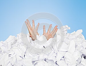 Human buried in papers