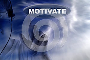 Human and button with word motivate