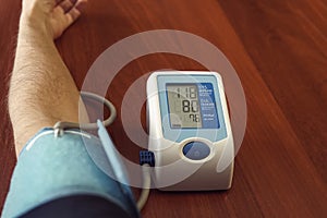 Human check blood pressure monitor and heart rate monitor with digital pressure gauge.