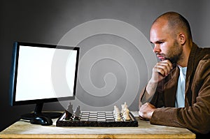 Human chess player against computer