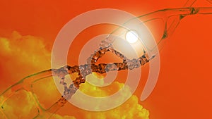 human dna structure with glass helix destroyed, deoxyribonucleic acid on sun and orange clouds background, nucleic acid molecules