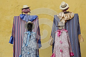 Human Dolls Abstract Image Traditional Guatemala Clothing Fashion Yellow Background
