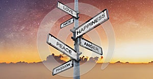 Human emotional and desires on directional signpost, with sunrise sky backgrounds photo