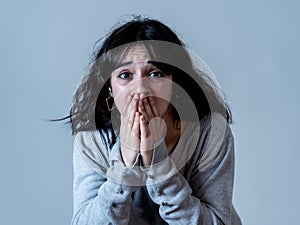 Human expressions and emotions. Young attractive woman looking scared and shocked