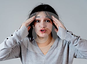 Human expressions and emotions. Young attractive woman looking scared and shocked