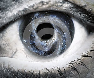 Human eye looking in Universe