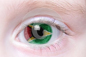 Human eye with national flag of guyana