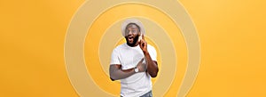 Human face expressions, emotions and feelings. Handsome young African American man looking up with thoughtful and