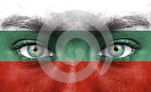 Human face painted with flag of Bulgaria
