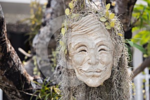 Human face pot Conceptual sculpture in Rongkhun Temple Chiangrai, Thailand