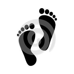 Human feet black silhouette. Footprint with toes icon. photo