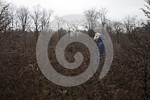 Human figure with sheep head. Halloween autumn scene. weird photo