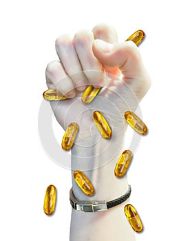 Human fist with omega3 pills