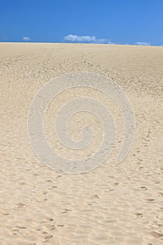 Human footsteps in the sand dunes