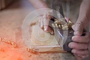 The human hand that carpentry work with traditional methods