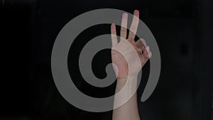 Human hand doing Alphabet F sign language in HD. F alphabet sign.