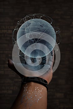Human hand with globe Earth