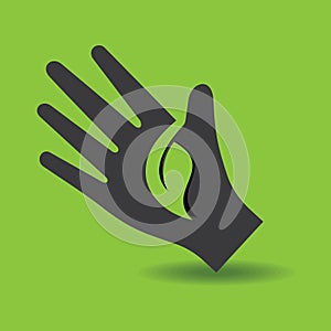 Human hand with green leaf symbol concept