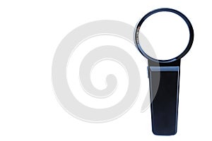 Human hand holding black magnifying glass on whithe background.