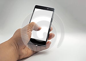 Human hand holding blank screen smart phone  on white background