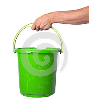 Human hand holding empty plastic pail