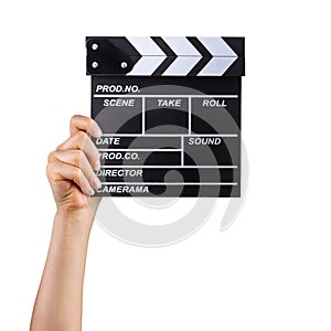 Human hand holding film clapper board isolated on white background