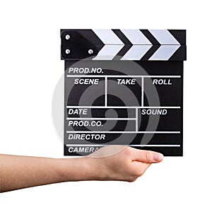 Human hand holding film clapper board isolated on white background