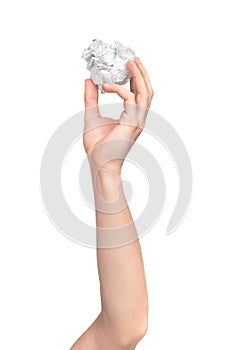 Human hand holding paper ball shooting