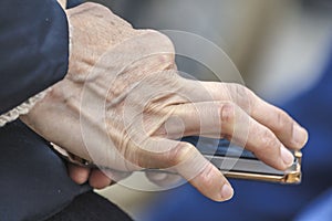 Human hand holding a smartphone