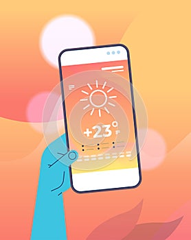 human hand holding smartphone with daily temperature mobile app weather forecasting and meteorology