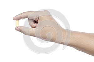 Human hand holding tablets pill