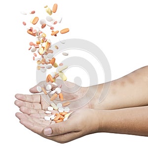 Human hand holding tablets pill