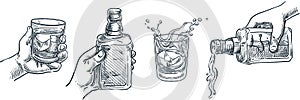 Human hand holding whiskey glass. Scotch whisky or brandy pouring out of bottle. Vector hand drawn sketch illustration photo