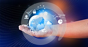 Human hand holding the world