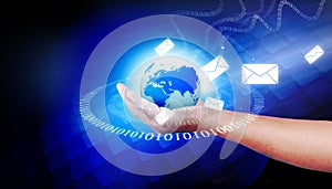 Human hand holding the world