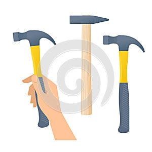 Human hand holds hammer. Hammers with wooden and plastic handles