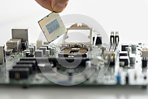 The human hand is installing the processor