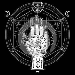 Human hand painted with magic symbols. Alchemical circle of transformations.