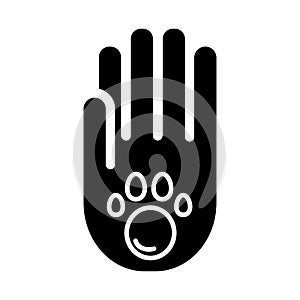 Human hand and paw inside simple vector icon. Black and white illustration of adopt pet. Solid linear icon.