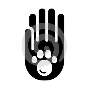 Human hand and paw inside simple vector icon. Black and white illustration of adopt pet. Solid linear icon.