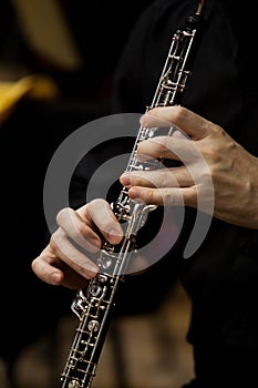 Human Hand playing the oboe
