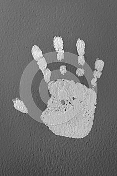 Human hand print on the wall