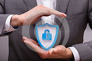 Human Hand Protecting Shield Security Icon