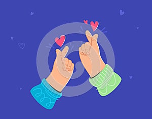 Human hand showing korean love sign by fingers