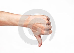 Human hand showing thumb down