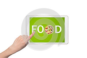 Human hand touching, pointing on tablet screen with food text