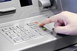 Human hand using ATM machine