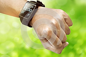 Human hand wearing smart watch